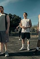 Andrew Santino, Steven Yeun, Young Mazino, and Rekstizzy in Beef (2023)