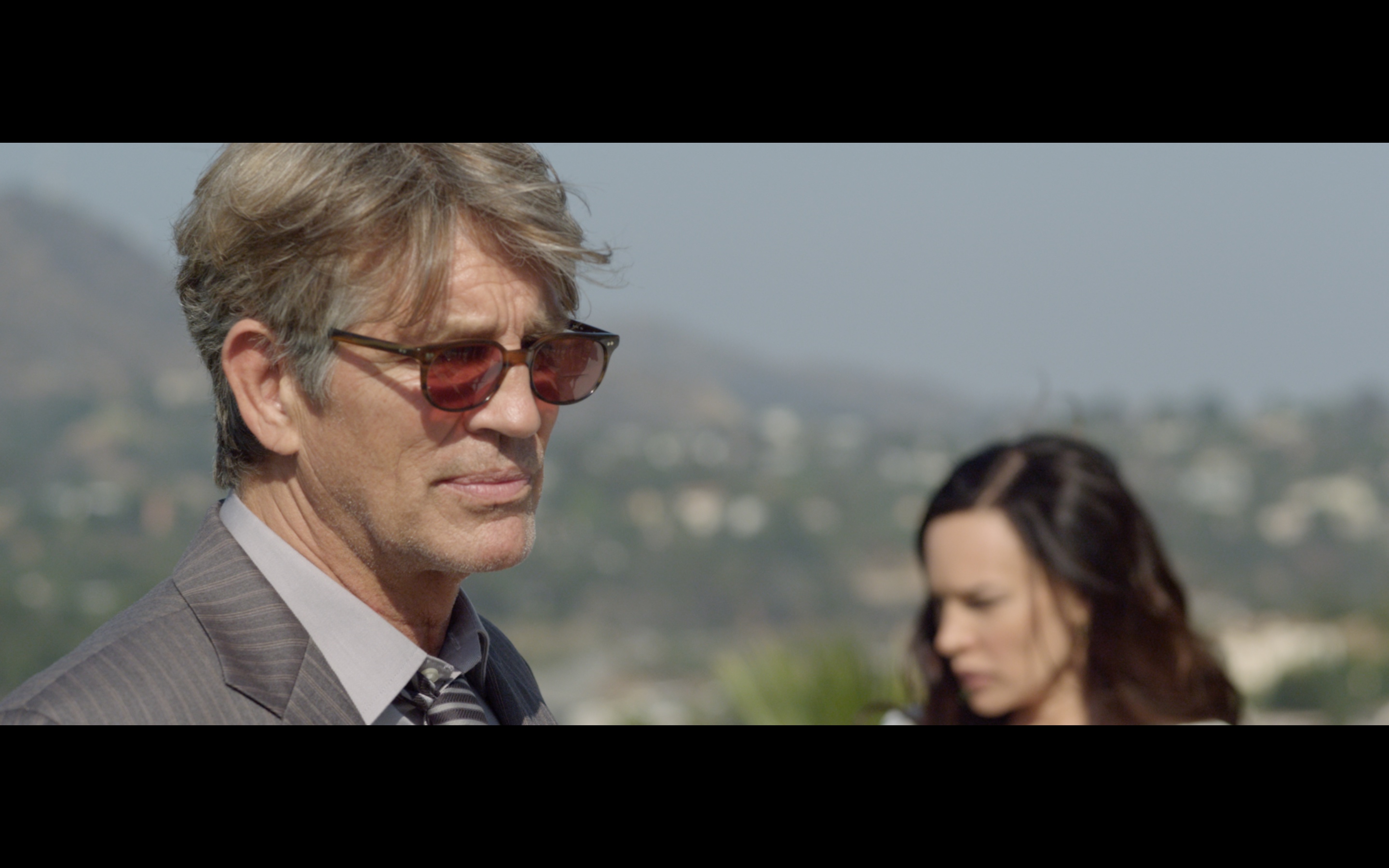 Eric Roberts and Natasha Alam in The Code of Cain (2016)