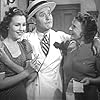 Roscoe Karns, Lynne Roberts, and Mary Hart in Everything's on Ice (1939)