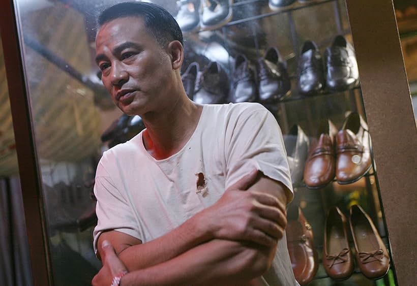 Simon Yam in Echoes of the Rainbow (2010)