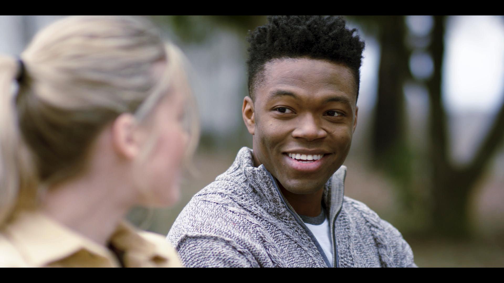 Caleb Castille and Rose Reid in The World We Make (2019)