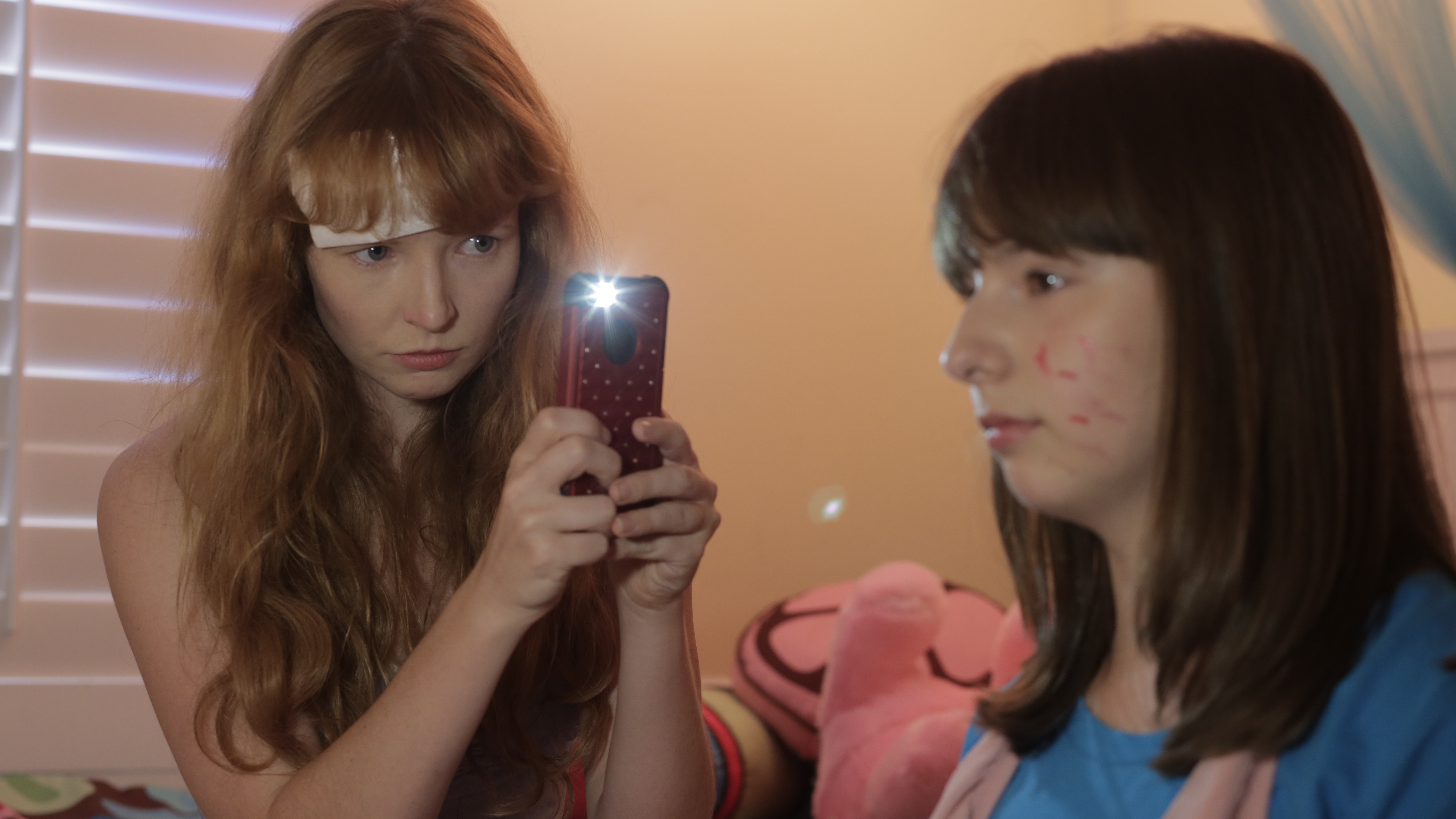 Stef Dawson and Chelsea Cook in Rage of Innocence (2014)