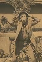 Rube Miller in Shot in the Excitement (1914)