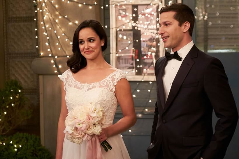 Melissa Fumero and Andy Samberg in Brooklyn Nine-Nine (2013)