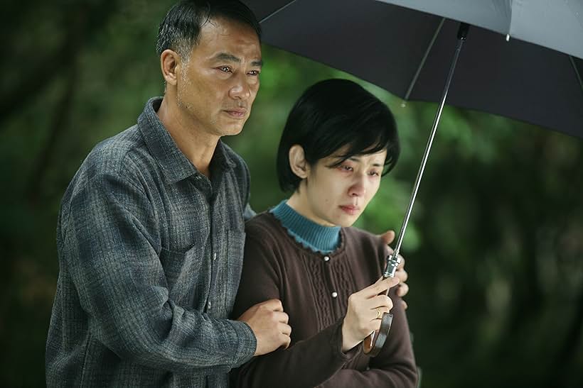 Sandra Kwan Yue Ng and Simon Yam in Echoes of the Rainbow (2010)