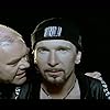 Paul McGuinness and The Edge in U2: Numb (1993)