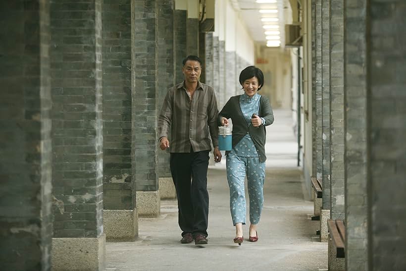 Sandra Kwan Yue Ng and Simon Yam in Echoes of the Rainbow (2010)