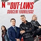 Pierce Brosnan, Ellen Barkin, Nina Dobrev, and Adam Devine in The Out-Laws (2023)