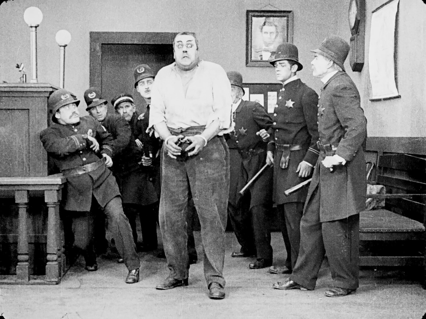 Albert Austin, Eric Campbell, John Rand, and Tom Wood in Easy Street (1917)