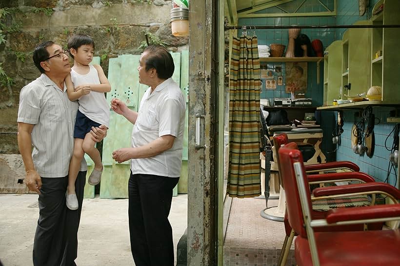 Paul Chun and Buzz Chung in Echoes of the Rainbow (2010)