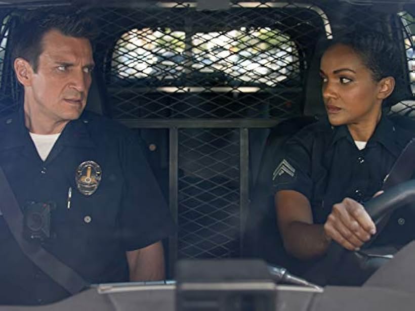 Nathan Fillion and Mekia Cox in Warriors and Guardians (2019)