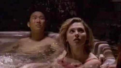 Tinsley Grimes and Eddie Shin in That '80s Show (2002)