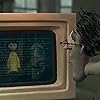 Dakota Fanning and John Hodgman in Coraline (2009)