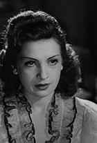 Huguette Vivier in The Murderer Lives at Number 21 (1942)