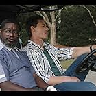 John Cena and Lil Rel Howery in Vacation Friends (2021)