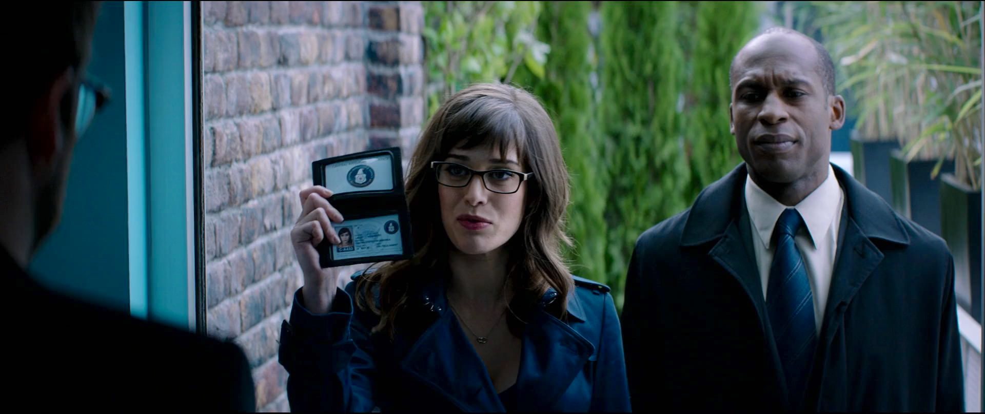 Reese Alexander, Lizzy Caplan, and Seth Rogen in The Interview (2014)