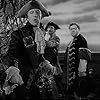 Charles Laughton, Lumsden Hare, and John Qualen in Captain Kidd (1945)