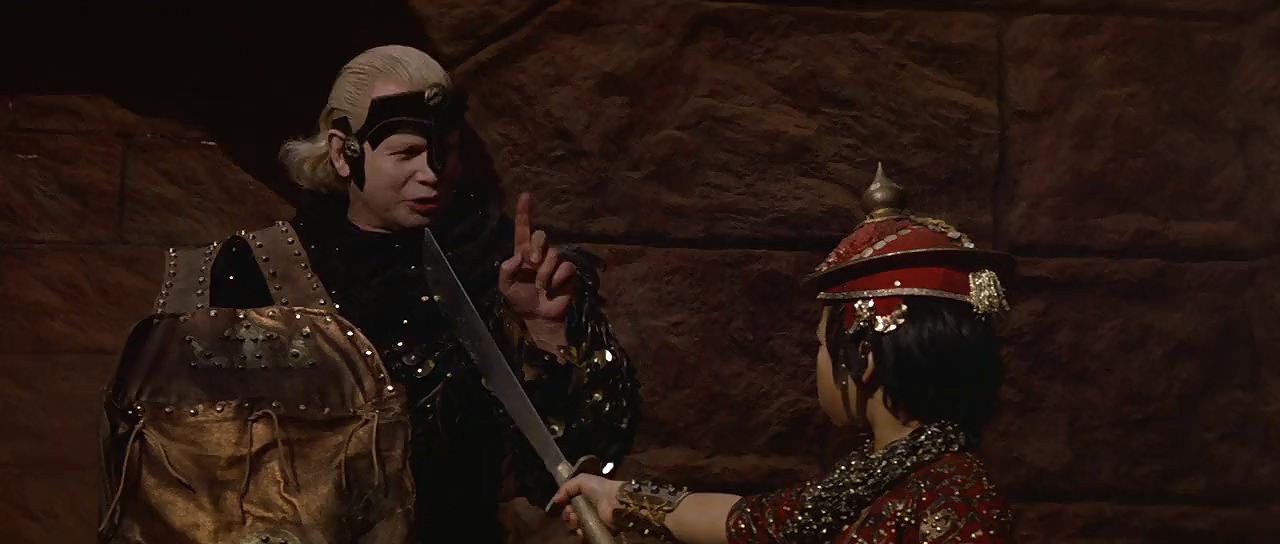 Ronald Lacey and Ernie Reyes Jr. in Red Sonja (1985)