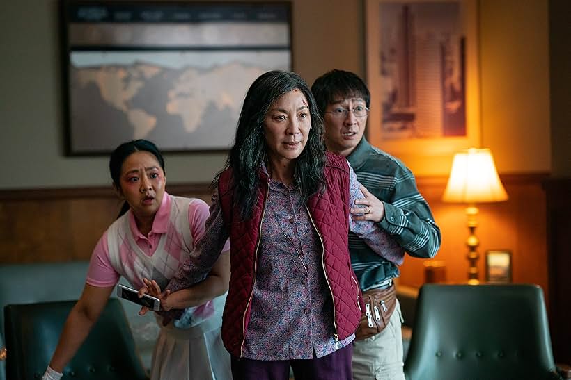 Michelle Yeoh, Ke Huy Quan, and Stephanie Hsu in Everything Everywhere All at Once (2022)