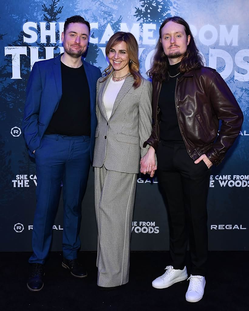 Cara Buono, Erik Bloomquist, and Carson Bloomquist at an event for She Came from the Woods (2022)