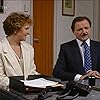 Peter Bowles and Penelope Keith in Executive Stress (1986)