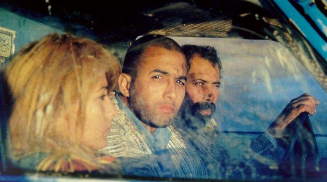 Amal Chabli, Rachid El Ouali, and Mohamed Razine in Mektoub (1997)