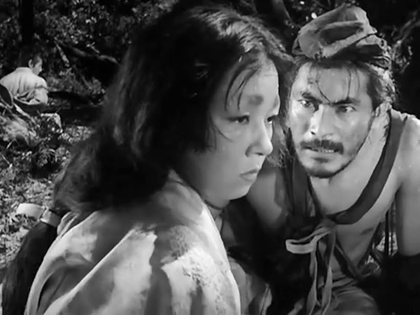 Toshirô Mifune and Machiko Kyô in Rashomon (1950)