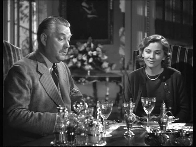 Joan Fontaine and Nigel Bruce in Rebecca (1940)