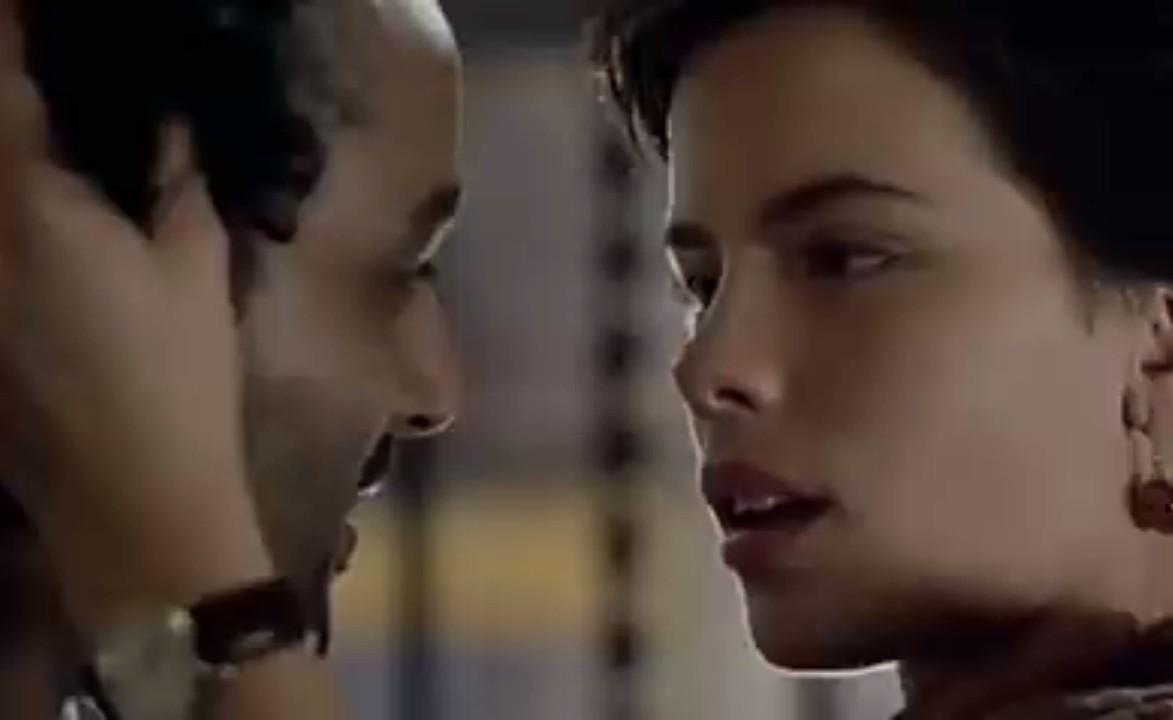 Kate Beckinsale and Art Malik in Uncovered (1994)