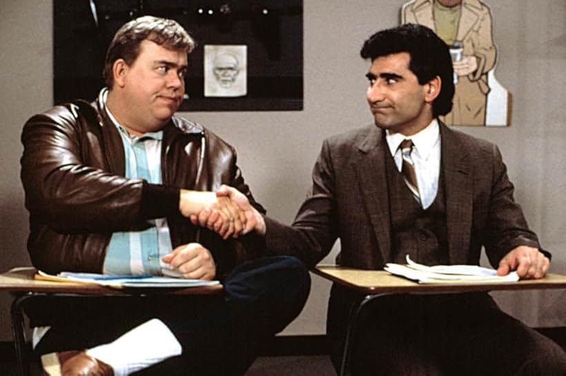 John Candy and Eugene Levy in Armed and Dangerous (1986)