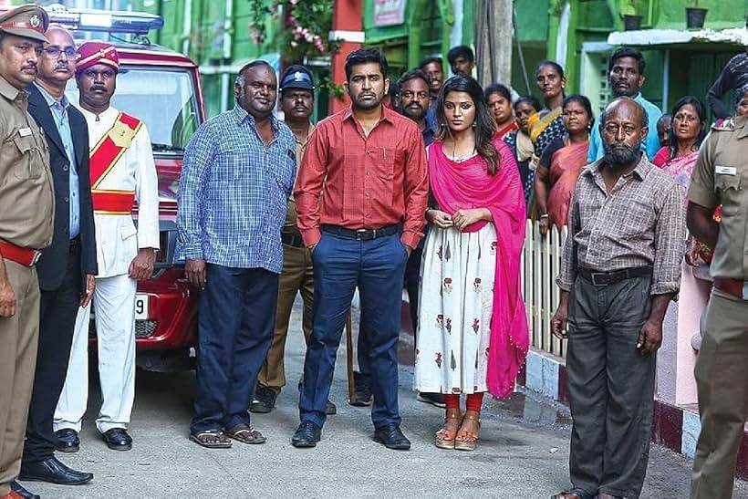 Vijay Antony, Karuppu Nambiyaar, and Aathmika in Kodiyil Oruvan (2021)