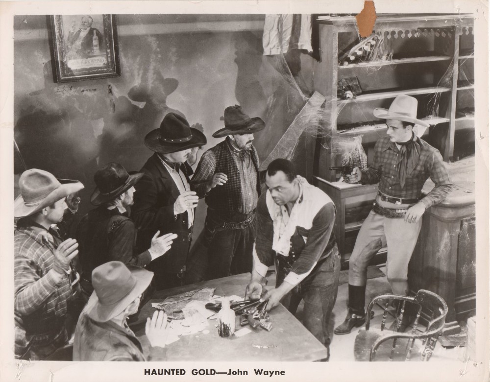 John Wayne, Tom Bay, Ben Corbett, Jim Corey, Blue Washington, and Harry Woods in Haunted Gold (1932)