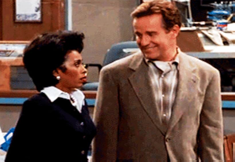 Khandi Alexander and Phil Hartman in NewsRadio (1995)