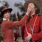 Lily Tomlin and Dennis Allen in Rowan & Martin's Laugh-In (1967)
