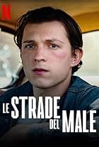 Tom Holland in Le strade del male (2020)