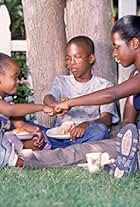 Jeremy Suarez, Camille Winbush, and Dee Dee Davis in The Bernie Mac Show (2001)