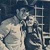 Louise Currie and Charles Starrett in The Pinto Kid (1941)