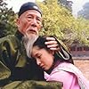 Bing Wang and Xiaojie Zhang in Zou xiang gong he (2003)