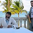 Andy Garcia and Chris Evans in Pain Hustlers (2023)