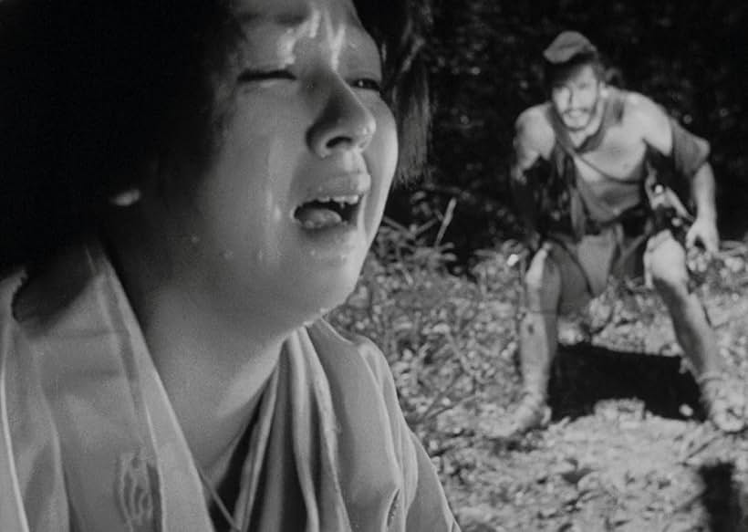 Toshirô Mifune and Machiko Kyô in Rashomon (1950)