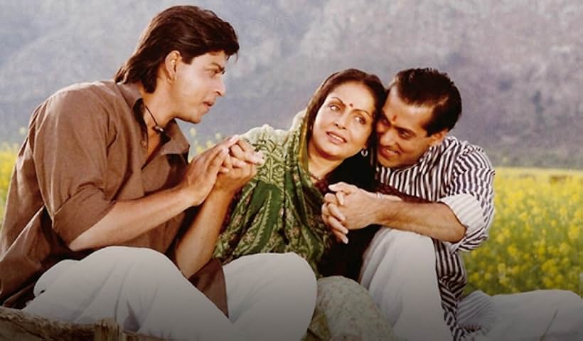 Salman Khan, Rakhee Gulzar, and Shah Rukh Khan in Karan Arjun (1995)