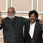 Chandrabose and M.M. Keeravani at an event for RRR (2022)