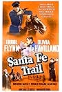 Olivia de Havilland, Errol Flynn, Ronald Reagan, and Raymond Massey in Santa Fe Trail (1940)