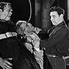 Boris Karloff, Lon Chaney Jr., and Glenn Strange in House of Frankenstein (1944)