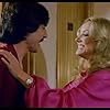 Barbara Bouchet and Tullio Solenghi in La moglie in vacanza... l'amante in città (1980)