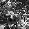 Charles Chaplin and Ernest Van Pelt in In the Park (1915)