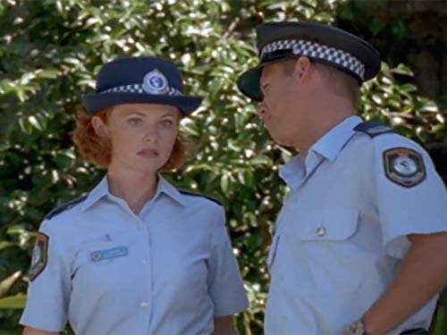 Raelee Hill and Brett Partridge in Water Rats (1996)