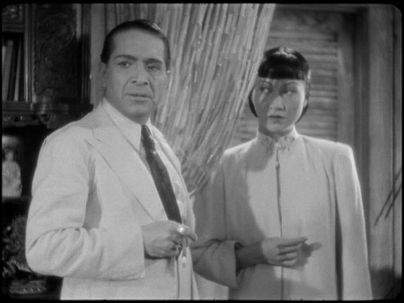 J. Carrol Naish and Anna May Wong in Island of Lost Men (1939)