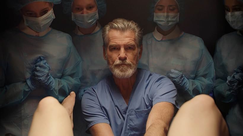 Pierce Brosnan, Gretchen Mol, and Sabina Gadecki in False Positive (2021)