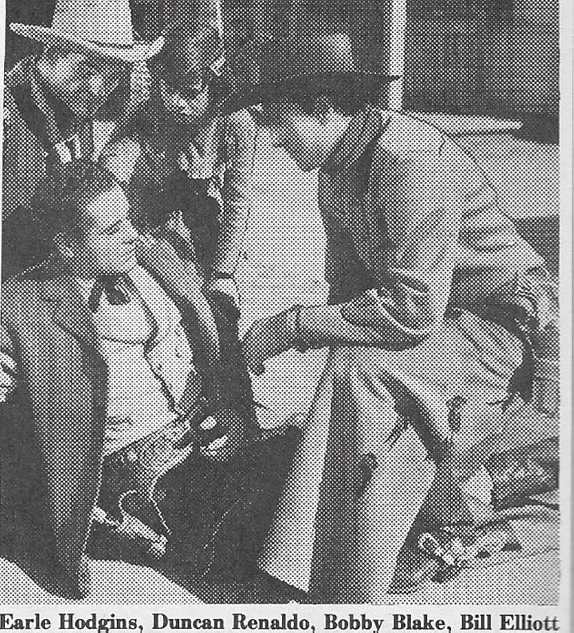 Robert Blake, Bill Elliott, Earle Hodgins, and Duncan Renaldo in The San Antonio Kid (1944)